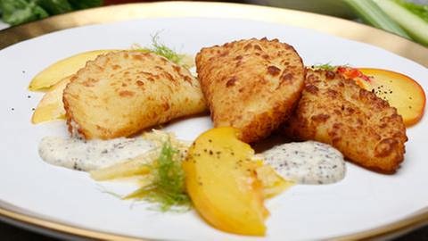 Kartoffel-Gemüse-Piroggen mit Mohnsauce (Foto: SWR, SWR - Simon Möschle)