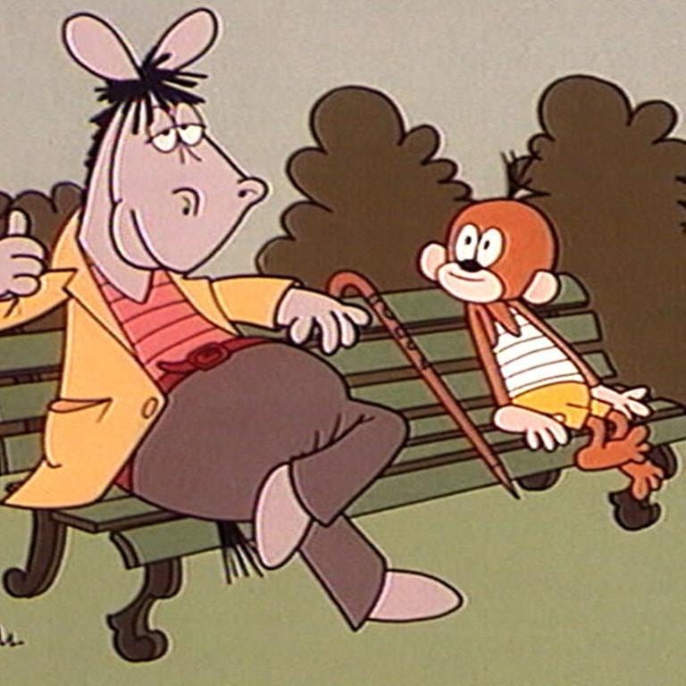 Zeichentrickfiguren Äffle und Pferdle sitzen auf einer Bank (Foto: SWR, SWR.de -)