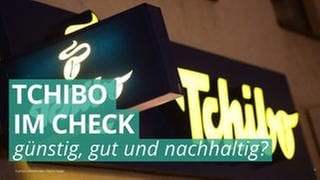 Tchibo-Logo leuchtet im Dunkeln. (Foto: picture-alliance / Reportdienste, picture alliance I Patrick Seeger)