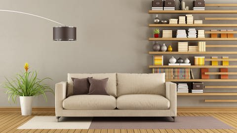 Wohnzimmer mit Sofa als Mittelpunkt (Foto: Getty Images, iStockphoto)