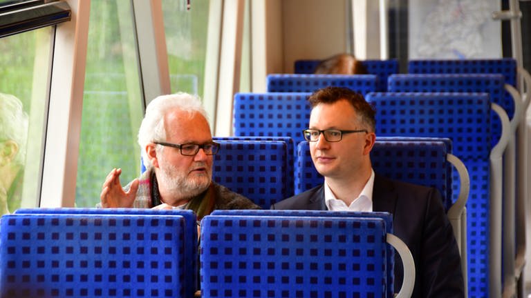 Schnaitmann und Schwarz im Dieseltriebzug nach Oberlenningen