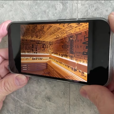 Saunakonzept auf einem Handybildschirm